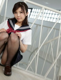 Asian schoolgirl Fumino Mizutori rails a hooded mans cumbot on a bed