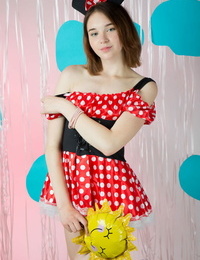 Petite young girl poses in the nude wearing Minnie Mouse ears only