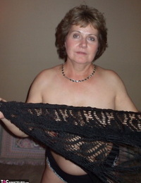 Erotic mature wife Busty Bliss shes lace shawl to spread topless in sexy thong