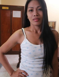 Filipina prostitute Analyn peels off naked on a motel couch for a hook-up tourist