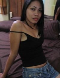 Filipina prostitute Analyn strips naked on a motel bed for a sex tourist