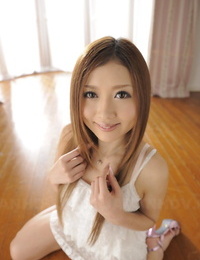 Beautiful Japanese girl Uta Kohaku lets a nip slip in satin lingerie