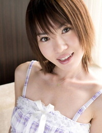 Youthful Japanese lady Mai exposes her tits for her boyfriend to play with