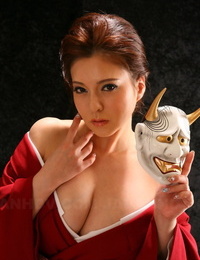Japanese model Yuki Tsukamoto fondles her stiff boobs as she gets naked