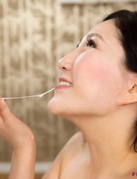 Japanese female Kazuki Yuu dribbles jism from her chin while sucking cock