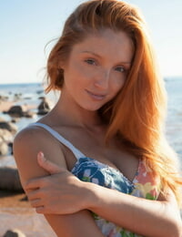 Hot redhead Michelle H flaunting her thick knockers & taut cunt on the beach