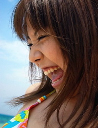 Japanese teen Chikaho Ito models non nude at the beach in a bikini