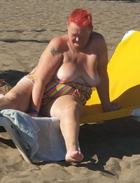 Old SSBBW Val Gasmic dyes her hair crimson before uncovering herself on the beach