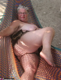 Obese nan Girdle Queen bares her large tits and huge belly on a hammock