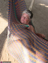 Obese nan Girdle Queen bares her large tits and huge belly on a hammock
