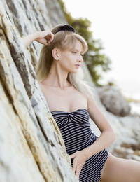 Thin molten teenage Nika N shedding bikini to bare diminutive nut sack & knockers in nature