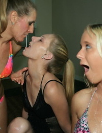 Mom and stepdaughters snowball jizz after jerking a dick in their bikini