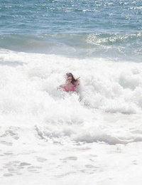 Winsome sweetheart Natalie Moore spends amazing day on the beach