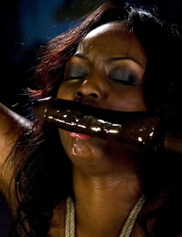Famous ebony pornstar Jada Fire gets fucked with a toy while shes tied up