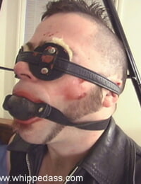 Eyes covered dude with ball gag in facehole is dominated by domme Kym Wilde
