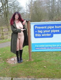 Sexy redhead mature BarbySlut spreading naked outdoors in coat & boots