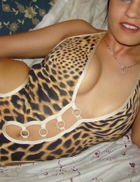Amateur teen lets her firm tits and tight ass loose from leopard print onesie