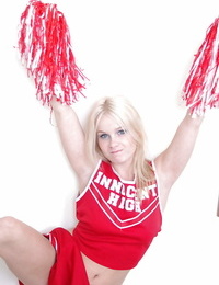 Schoolgirl cheerleader Kylee is a blonde honey that is stripping for us