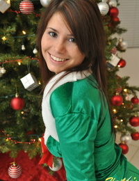 Amateur Xmas elf Hailey hoists her taut mini-skirt to display her wonderful nut sack by the tree