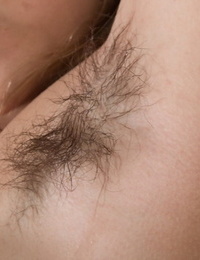 Pretty Baby Lizza sheds her Xmas costume to reveal hairy armpits and pussy