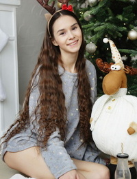 Adorable teen Leona Mia shows her thin body wearing deer antlers and socks