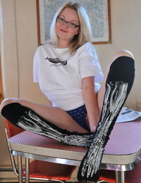 Older blonde Tasty Trixie slides panties aside wearing skeleton socks
