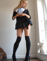 Hot blonde schoolgirl Elle Parker sheds uniform posing braless in lace subjugation