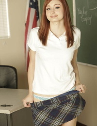 Redhead bombshell Violet Monroe goes insatiable and peels off in the classroom