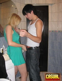 Young blonde and her boyfriend commence their lovemaking in the bathroom