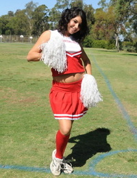 escuro cabelos cheerleader Christina moure Tiras a partir de ela uniforme