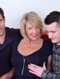 Horny British housewife is stripped and banged by 2 boys from the village