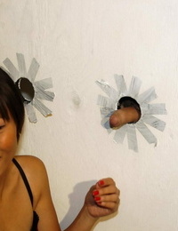 Asian whore Filipino Faye deep-throats the jism from cockslut cocks at a gloryhole