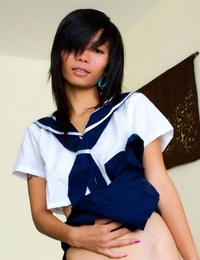 Asian schoolgirl Puy sports a cum facial after her cute panties are exposed