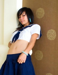 Asian schoolgirl Puy sports a cum facial after her cute panties are exposed