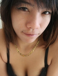 Young Asian girl Lexi makes her debut on a bed during POV act