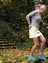 Cute light-haired Victoria Unspoiled hikes her miniskirt to take a piss along country lane