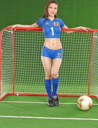 Foxy asian teen with molten ball-sac poses in body painted soccer garb