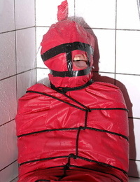 Miho Lechter packaged in the bathroom for fetish shower abjection