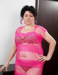 Shaven pussy of a mature fatty Gulya shown in rosy undergarments