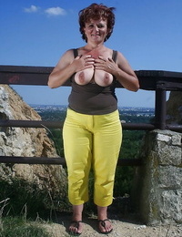 Wild granny revealing her fatty body with flabby hooters outdoor
