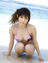 Busty asian stunner with neat ass Aya Hirai gliding off her swimsuit outdoor