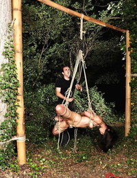 Asian BDSM unmanly Marica Hase is bound up in woods by rude masculine