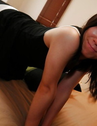Asian housewife Aiko Kurita stretching her fur covered Oriental vagina