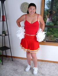 Lush Asian very first timer baring diminutive knockers while shedding cheer uniform