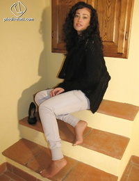 Black-haired honey Erica showing her gorgeous gams in pantyhose