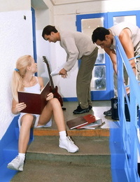 Thin college chick Debbie A pleases two classmates on the stairs