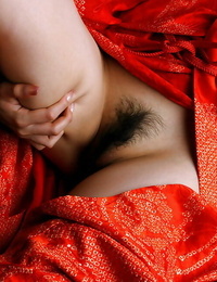 Lusty asian honey with hairy cunt uncovering her lil\' curves
