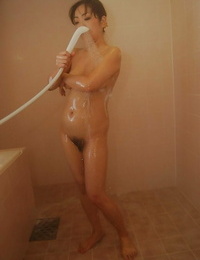 Mature asian lassie Yoriko Akiyoshi taking shower and caressing herself