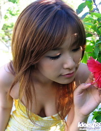 Lovely asian chick Yua Aida slipping off her sundress and panties