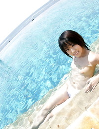 Cute asian honey Saki Ninomiya slipping off her dress and panties outdoor